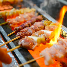 Assorted grilled chicken skewers