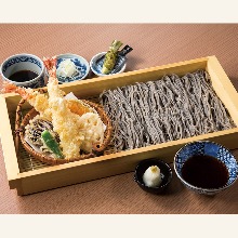 Buckwheat noodles served on a bamboo strainer with shrimp tempura