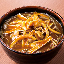 Buckwheat noodles with curry sauce and scallions