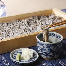 Buckwheat noodles served on a bamboo strainer