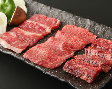 Assortment of three kinds of grilled beef with grilled vegetables