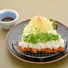 Pork loin cutlet served with fresh "ponzu" sauce (citrus-based soy sauce) and grated daikon radish