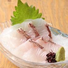 Thinly sliced sea bream sashimi