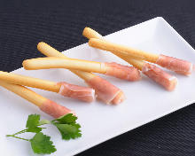 Prosciutto wrapped grissini (breadsticks)