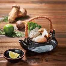 Matsutake steamed in an earthenware teapot