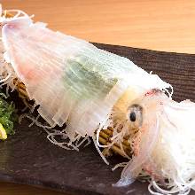 Live squid sashimi