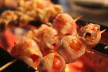 Wrapped tomato skewer