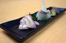 Thinly sliced sea bream sashimi