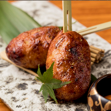 Meatballs served with egg yolk