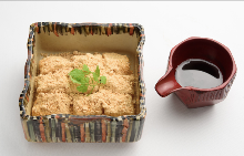 Warabimochi (bracken-starch dumpling covered in sweet, toasted soybean flour)