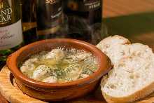 Oyster al ajillo with baguette