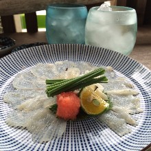 Thinly sliced pufferfish sashimi
