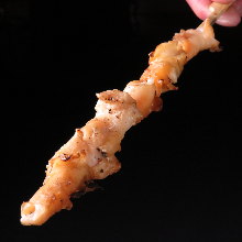 Grilled whelk skewer