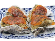 Grilled oysters with sea urchin sauce