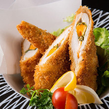Grilled chicken tenderloin with cheese