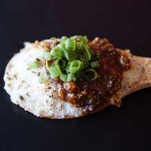 Salted meatballs with green onion and miso topping