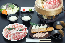 Pork steamed in a bamboo steamer