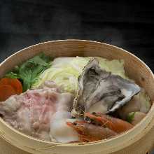 Steamed seafood in a bamboo steamer