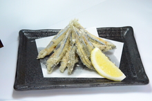 Fried silver-stripe round herring