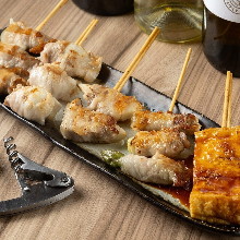 Teppanyaki Grilled pork rolled Enoki mushroom skewers