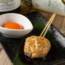 Meatballs served with egg yolk