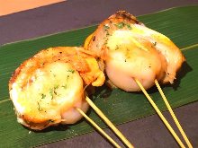 Grilled scallop skewer