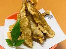 Fried silver-stripe round herring