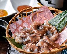 Live octopus sashimi