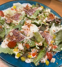 Caesar salad with prosciutto