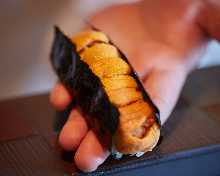 Hand-rolled sea urchin sushi