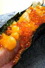 Hand-rolled sea urchin and salmon roe sushi