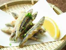 Fried silver-stripe round herring