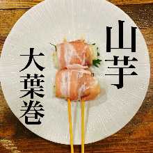 Grilled pork-wrapped Japanese yam and shiso skewer