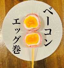 Bacon wrapped soft boiled egg skewer