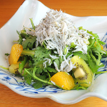 Fruite salad with boiled whitebait and crown daisy