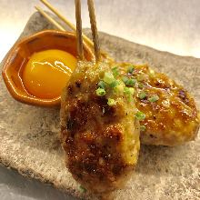 Meatballs served with egg yolk