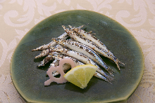 Salted and grilled silver-stripe round herring