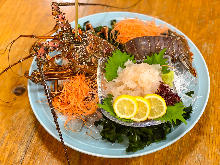 Live spiny lobster sashimi