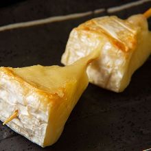 Charcoal grilled Camembert cheese