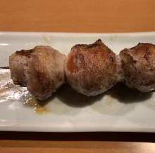 Pork wrapped tomato skewer