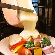 Raclette cheese with bacon and seasonal vegetables