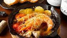 Shrimp al ajillo with baguette