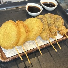 Fried quail egg skewer