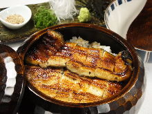 Extra premium eel served over rice in a lacquered box