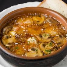 Shrimp al ajillo with baguette