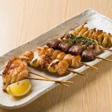 Assorted grilled chicken skewers