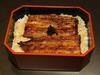 Eel served over rice in a lacquered box