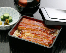 Eel served over rice in a lacquered box