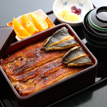 Eel served over rice in a lacquered box