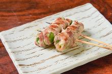 Pork wrapped green pepper and cheese skewer